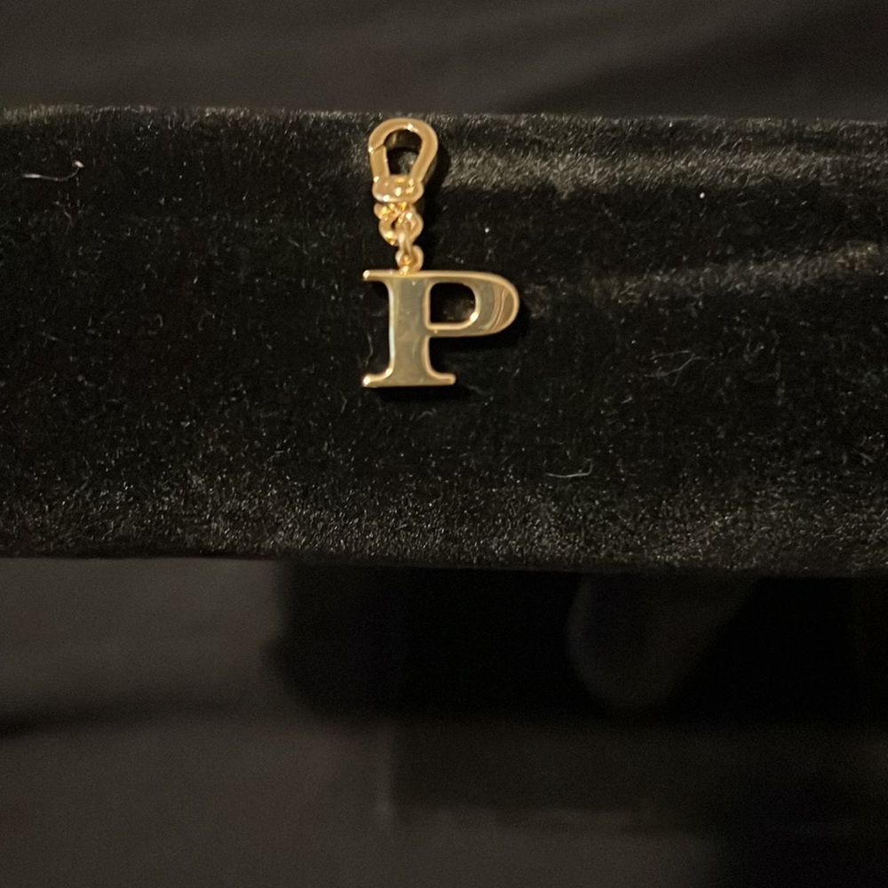 Coach P charm